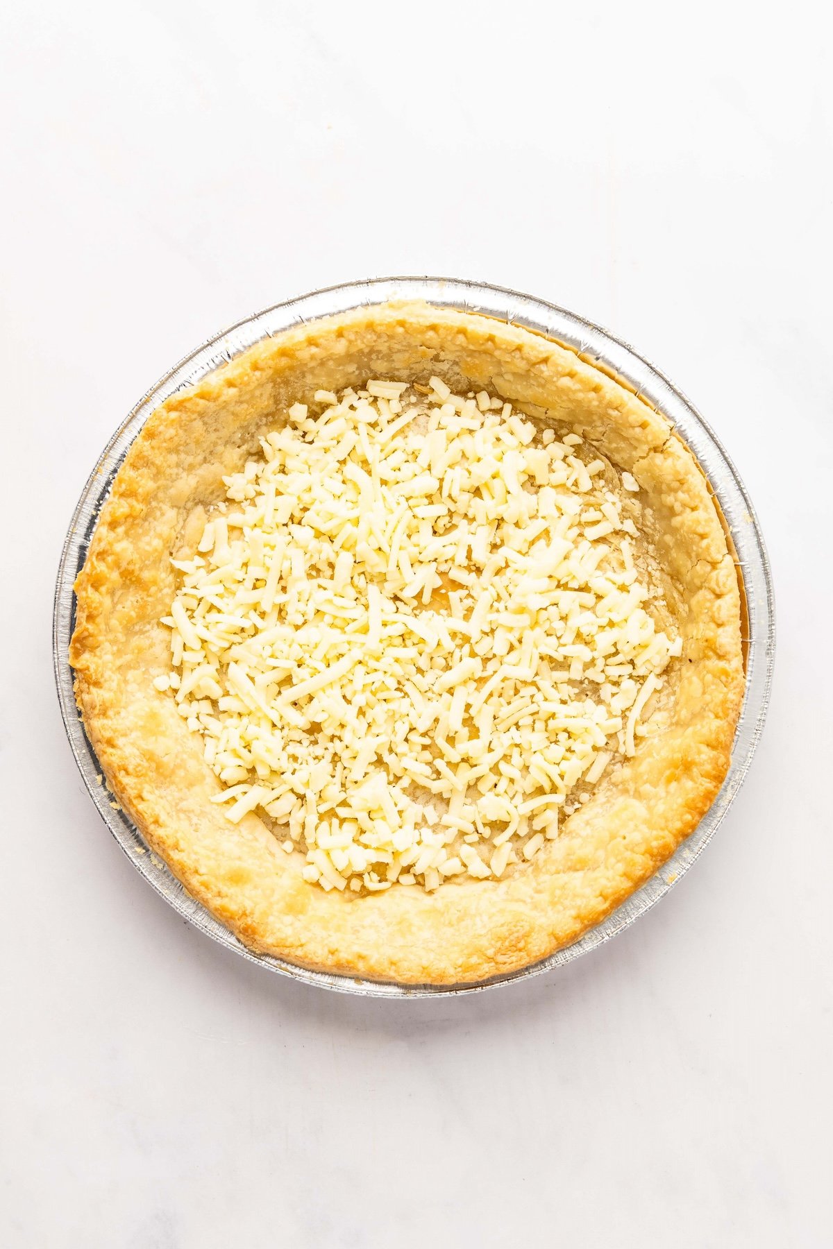 fontina cheese sprinkled over crust