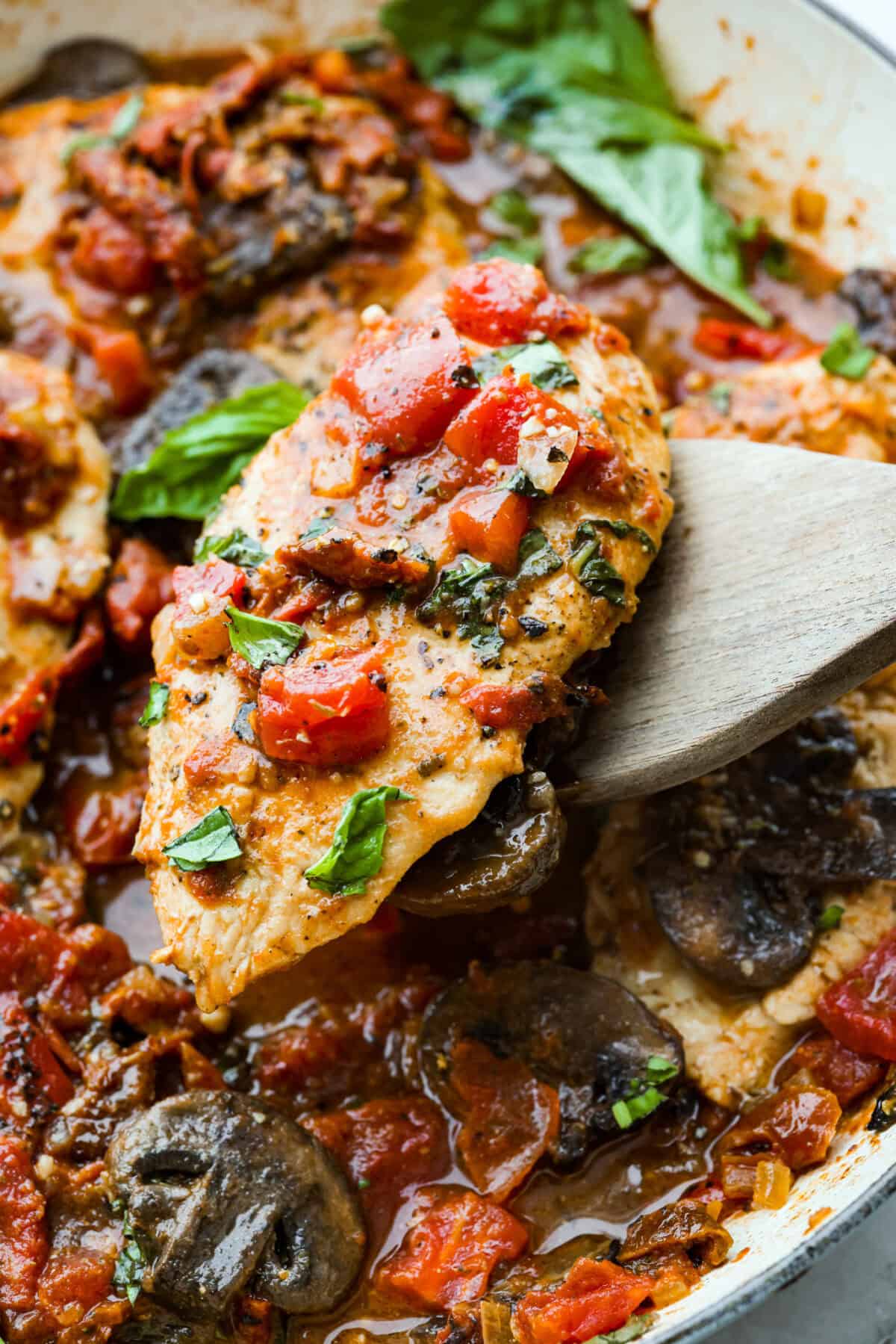 Close up shot of a Tuscan garlic skillet chicken breast. 