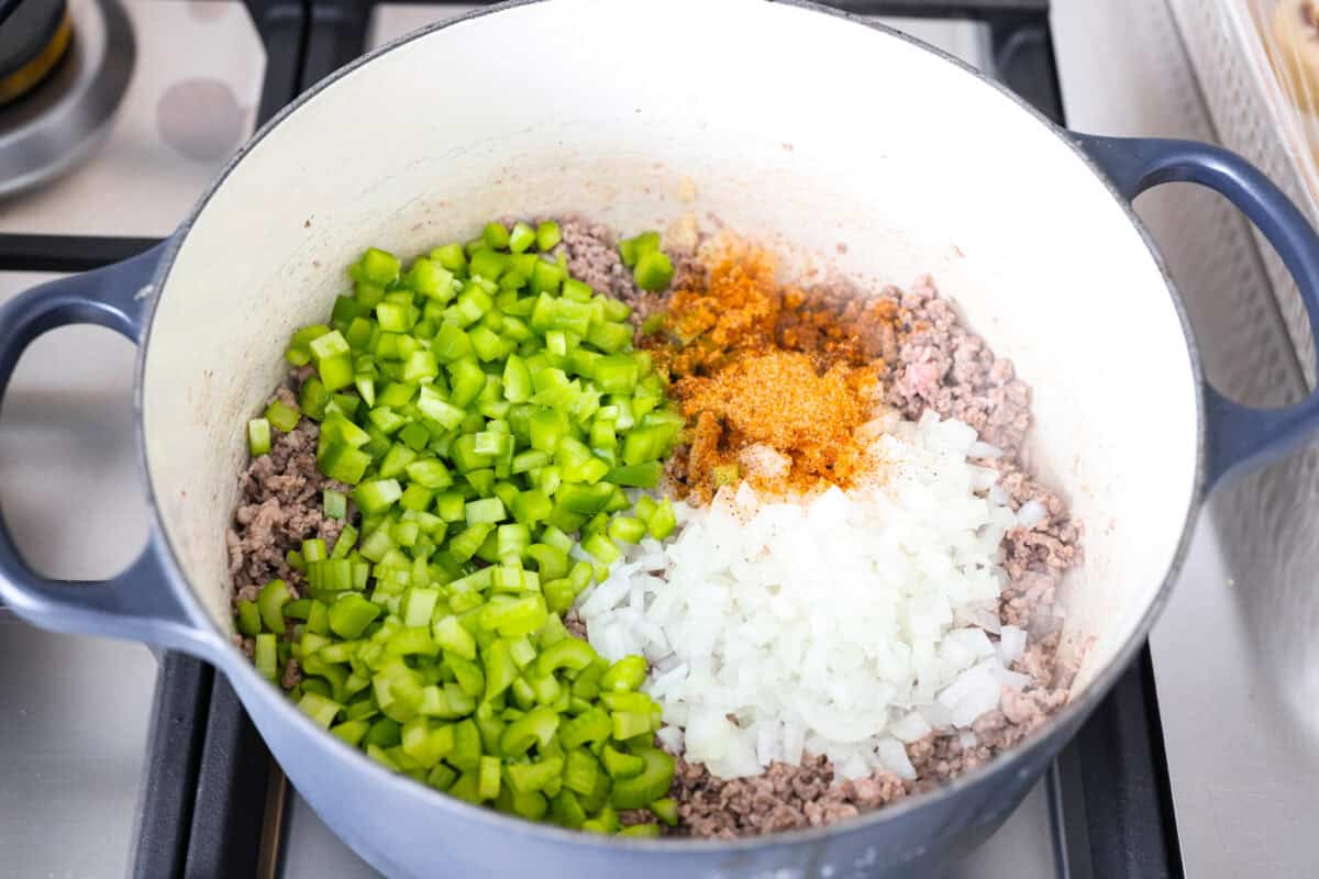 Veggies and spices added to the ground beef and pork. 