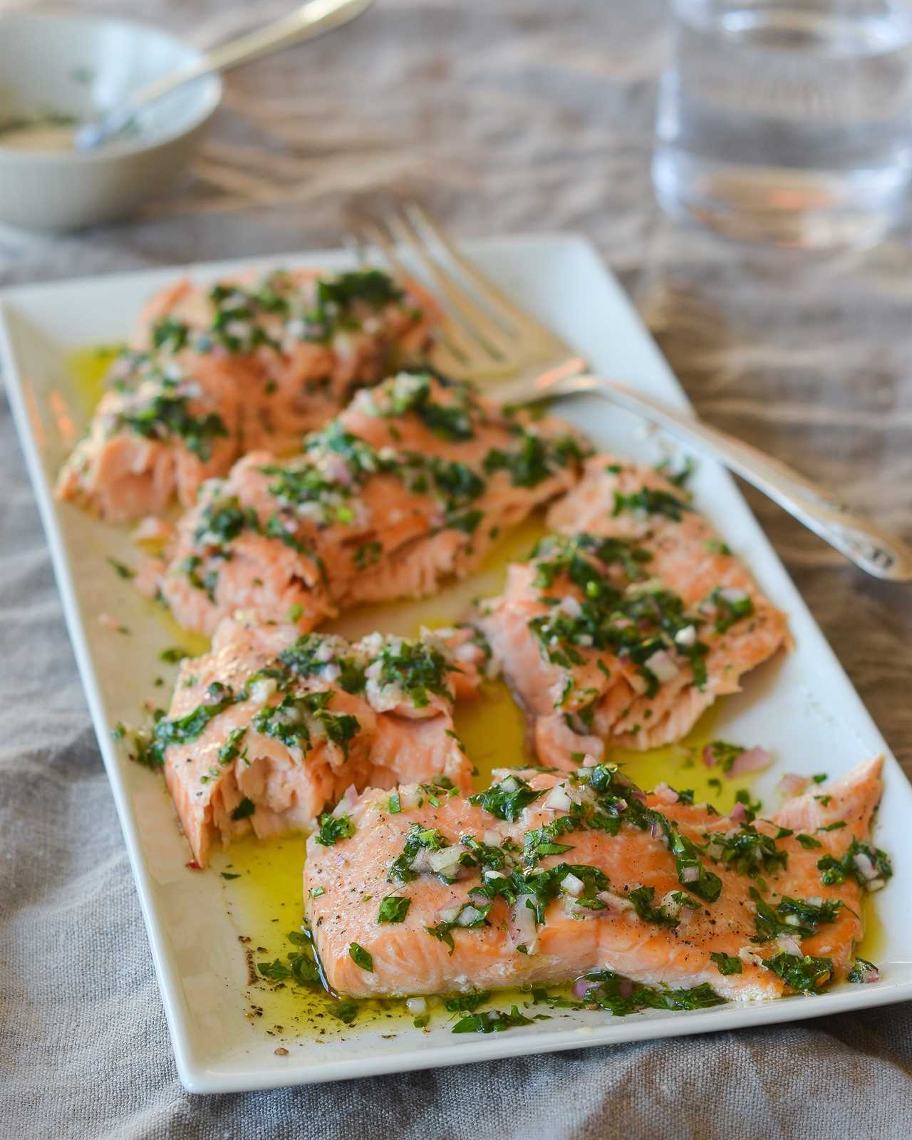 Platter of slow-roasted salmon with French herb salsa.