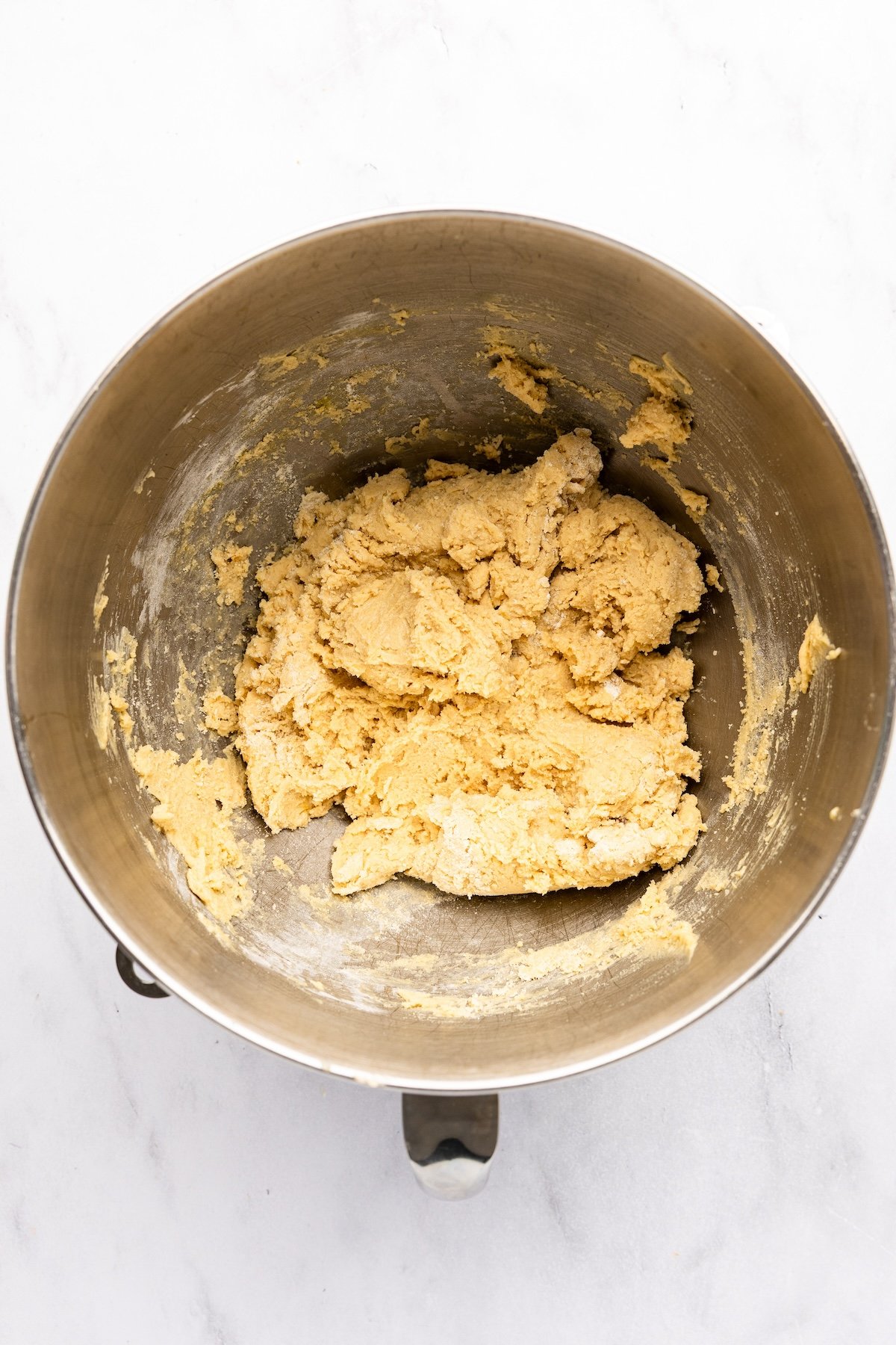 mixing bowl with flour combined with batter