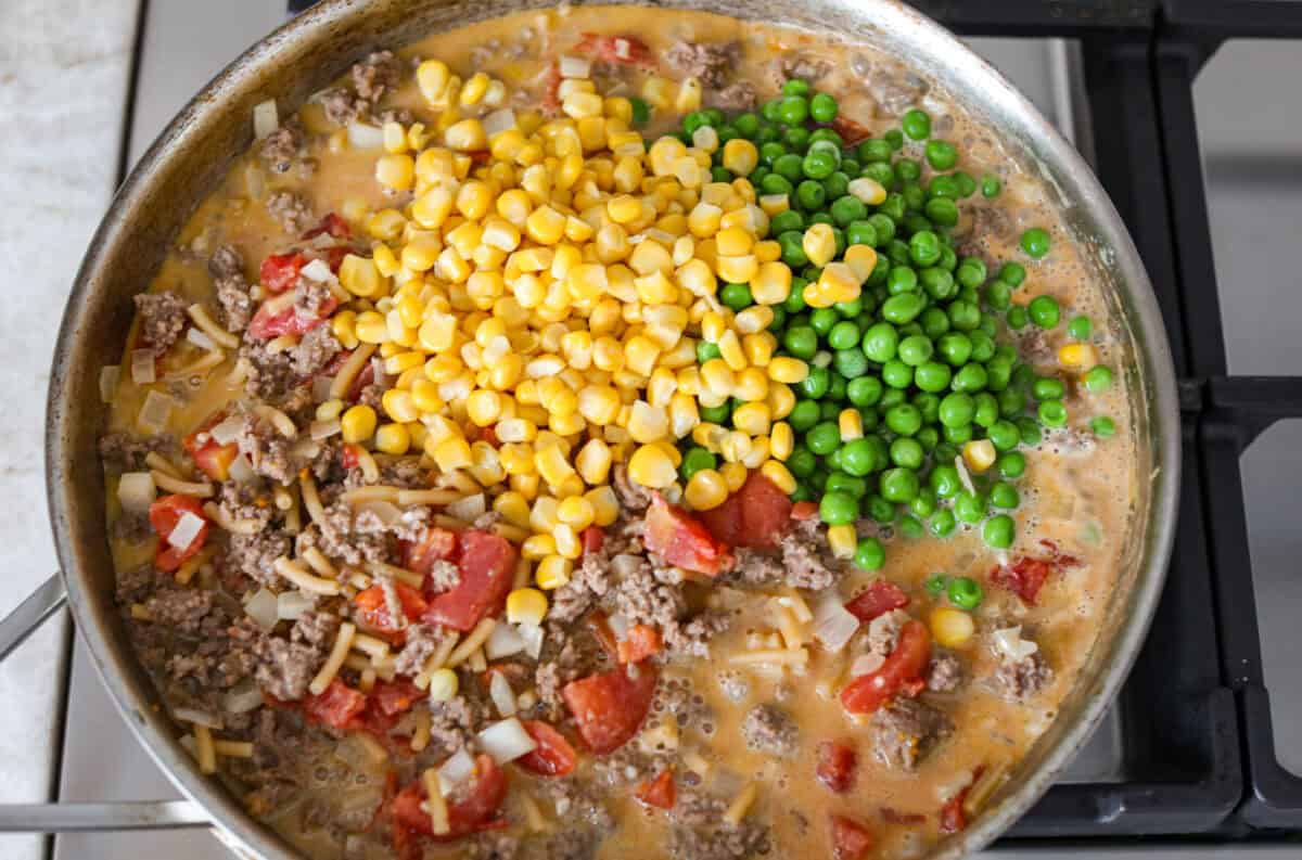 Veggies added to the skillet. 