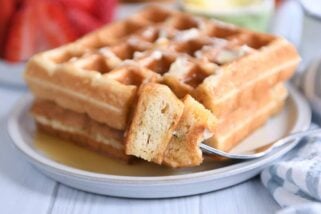 Fork with bite of waffles.