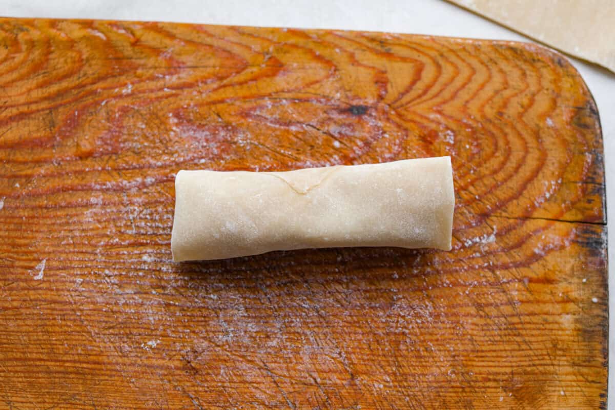 Crack Chicken Egg Rolls wrap savory chicken, crispy bacon, melty cheese, and zesty ranch in a golden, crunchy shell. Easy to make, lighter than deep-fried versions, and perfect for parties or game day! Crack chicken egg roll all wrapped and ready to go in the air fryer.