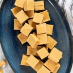 peanut butter fudge squares on blue platter