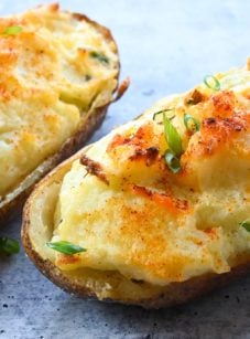 Twice baked potatoes on parchment paper.