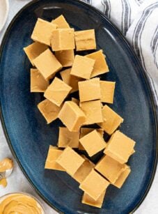 peanut butter fudge squares on blue platter