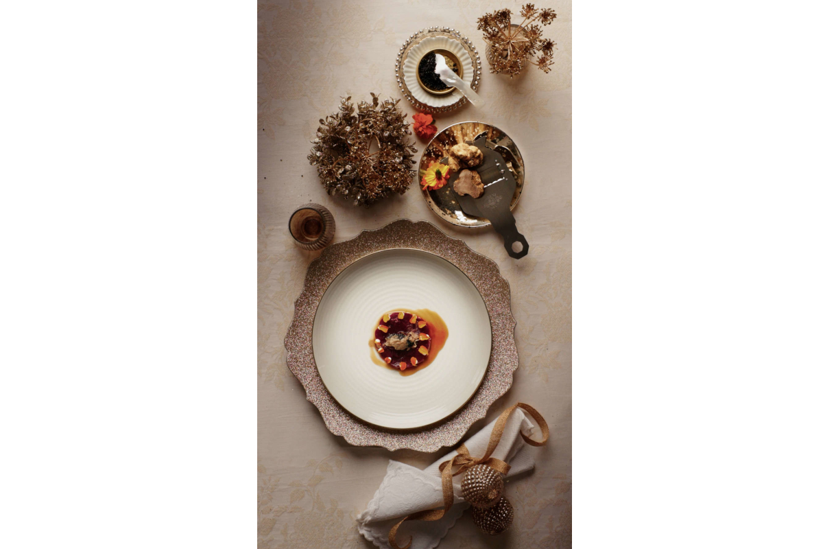 Elegant Urbani Tartufi dish. Gourmet food styling with truffles, caviar, and gold accents. Fine dining experience.