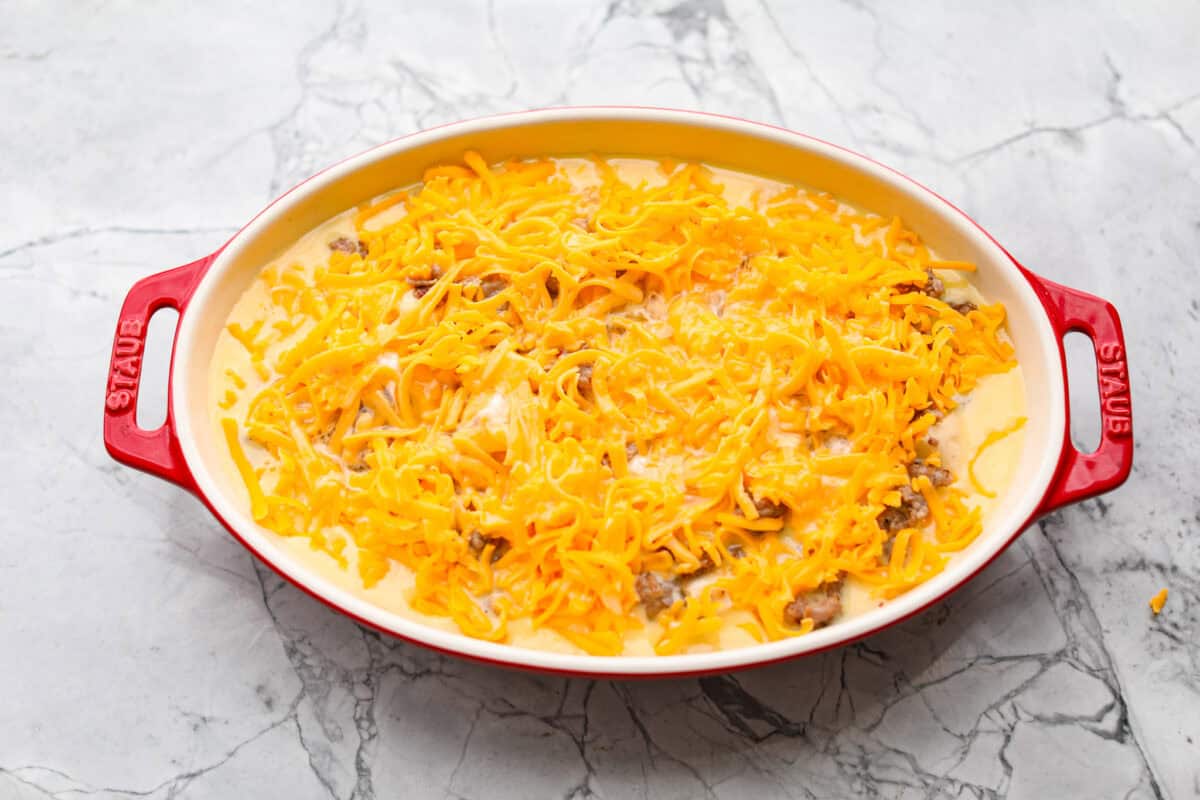 Egg mixture poured over the top of the Christmas breakfast casserole.