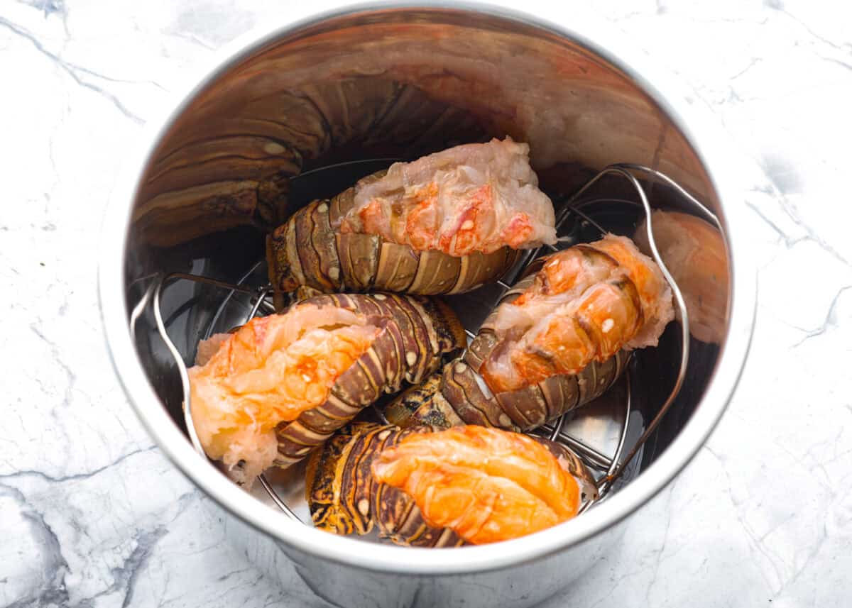 Lobsters tails added to the instant pot. 