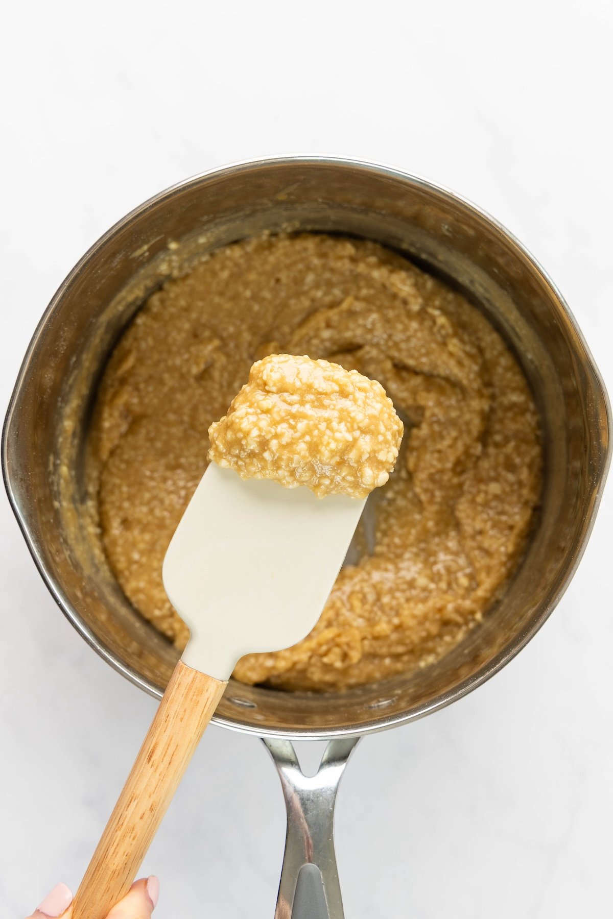 medium saucepan with cooled cookie batter