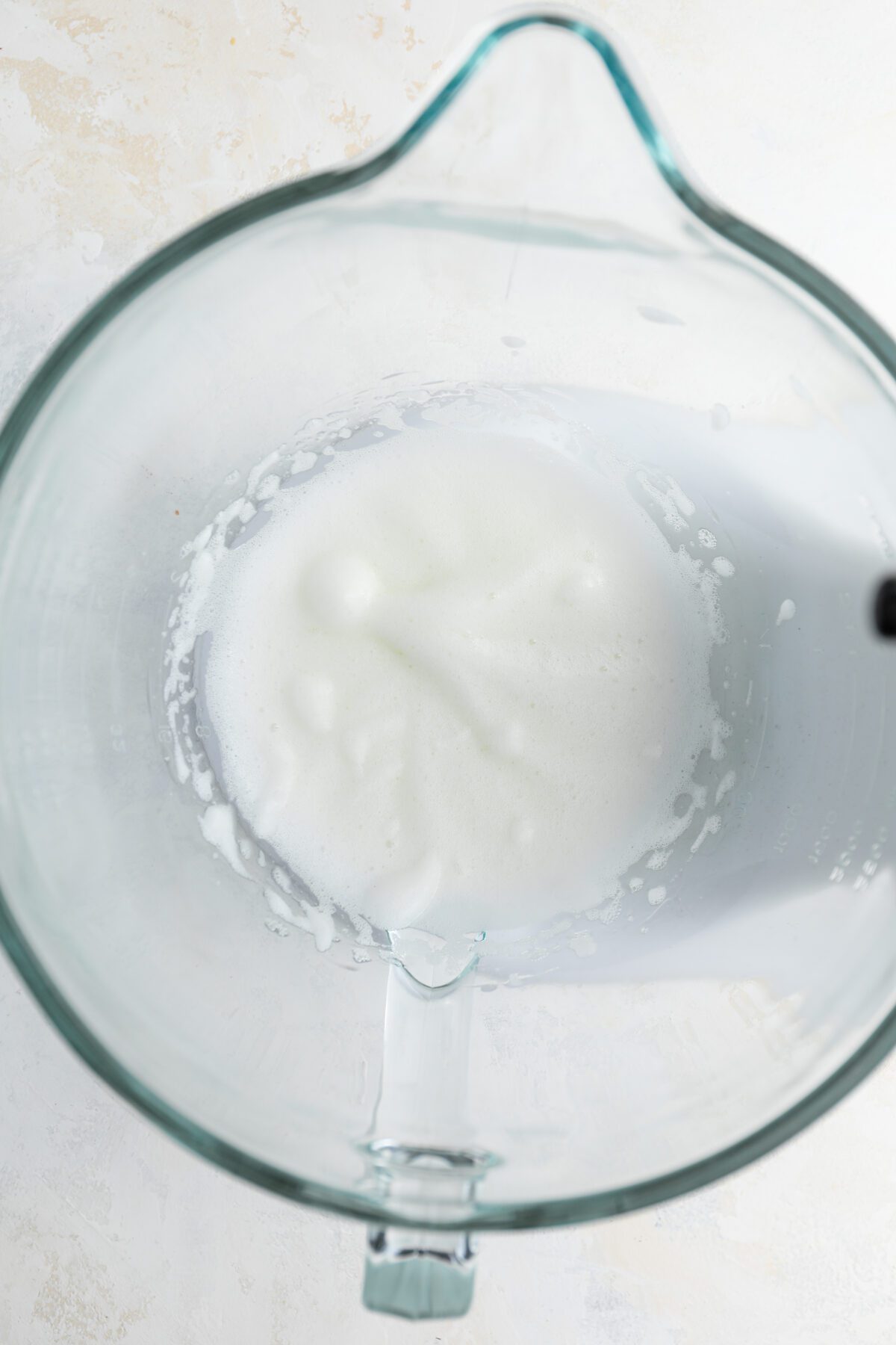 mixing bowl with beaten egg whites and cream of tartar
