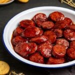 glazed kielbasa bites in white bowl