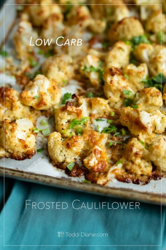 crispy frosted cauliflower with cheese on sheet pan 