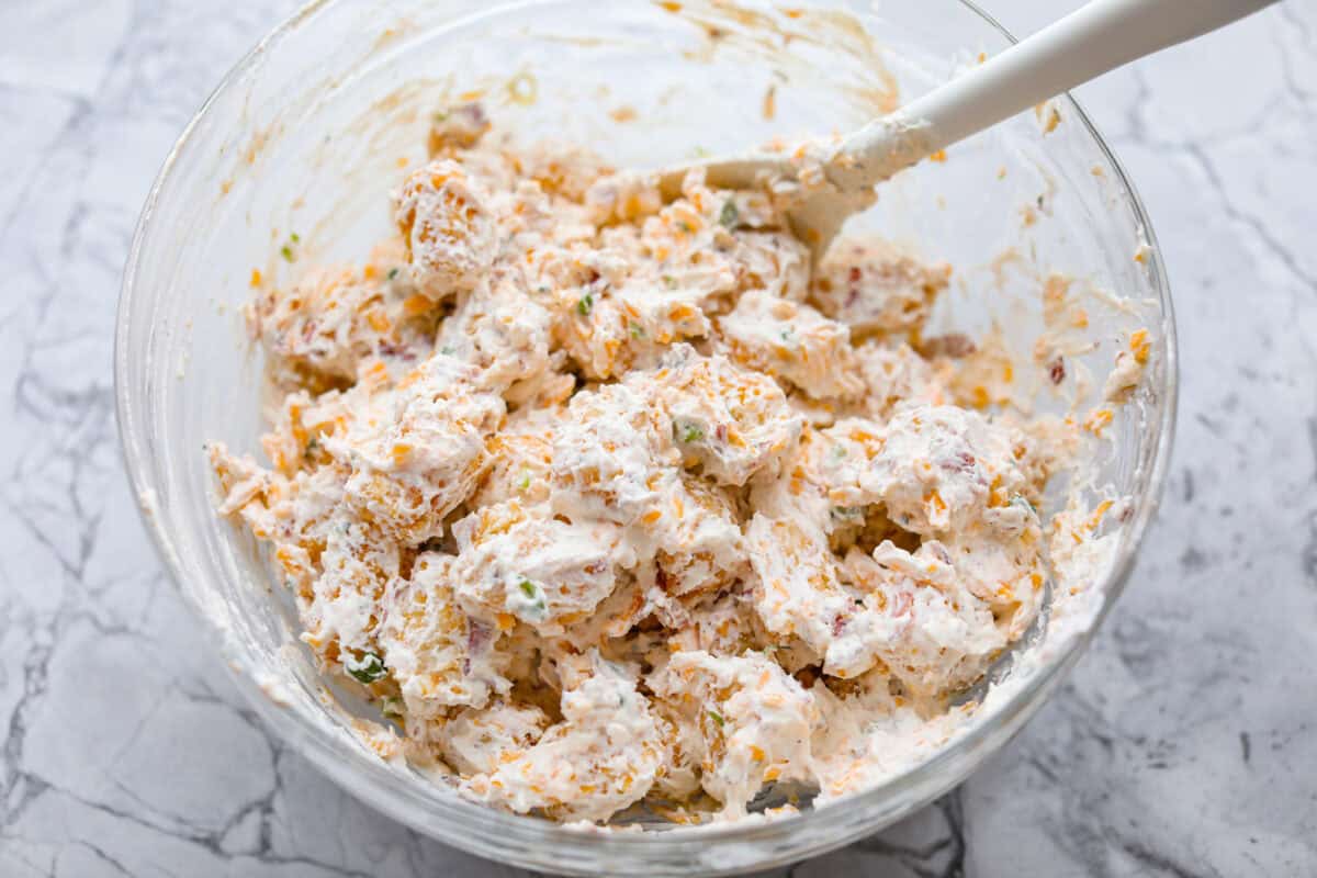 Tater tots added to the sauce mixture.