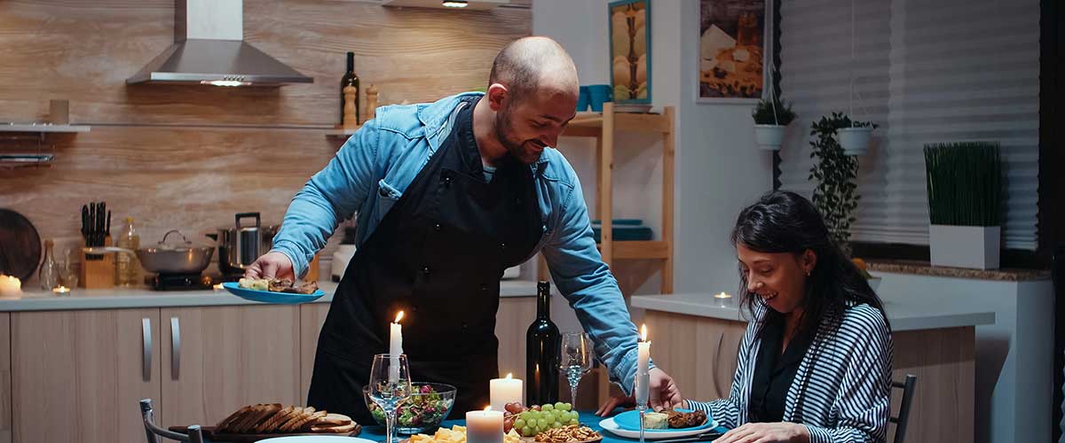 Married couples at different relationship stages celebrating anniversaries at home with thoughtful activities and gift baskets