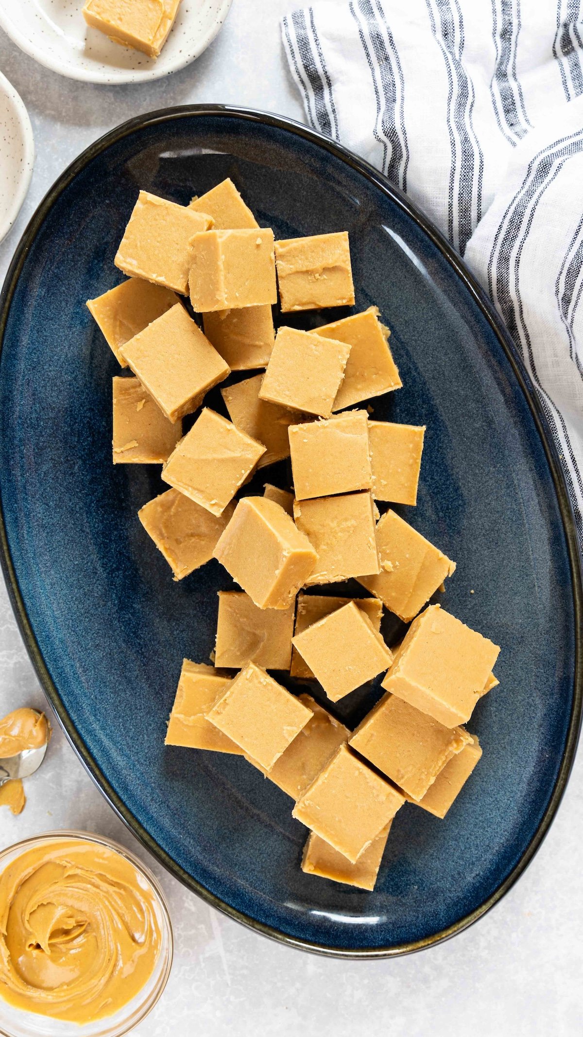 peanut butter fudge squares on blue platter