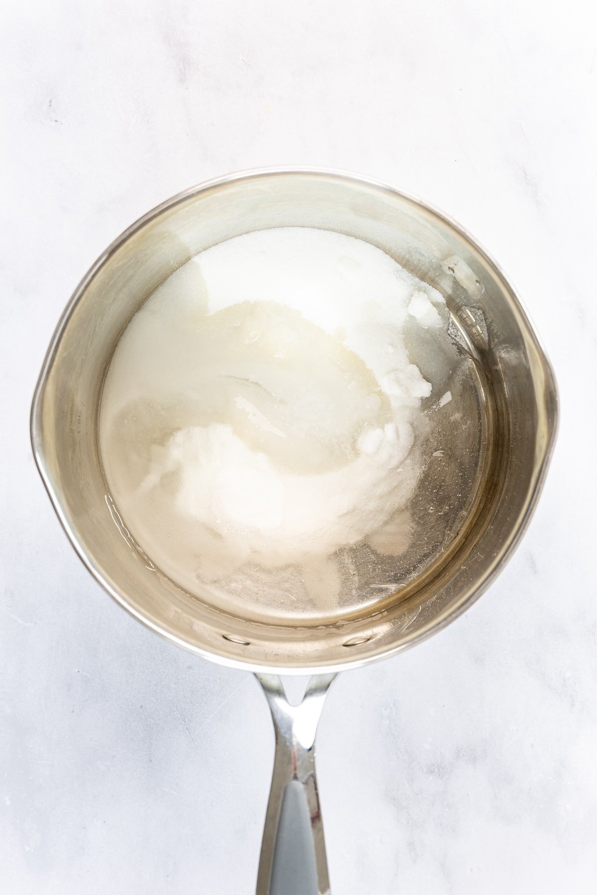 medium saucepan with sugar, corn syrup, water, and salt