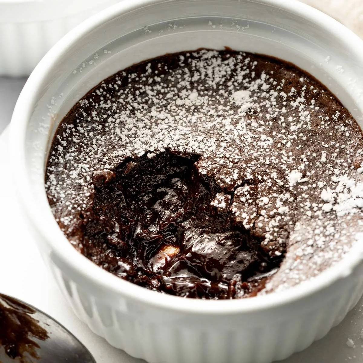 Brownie pudding in a ramekin.
