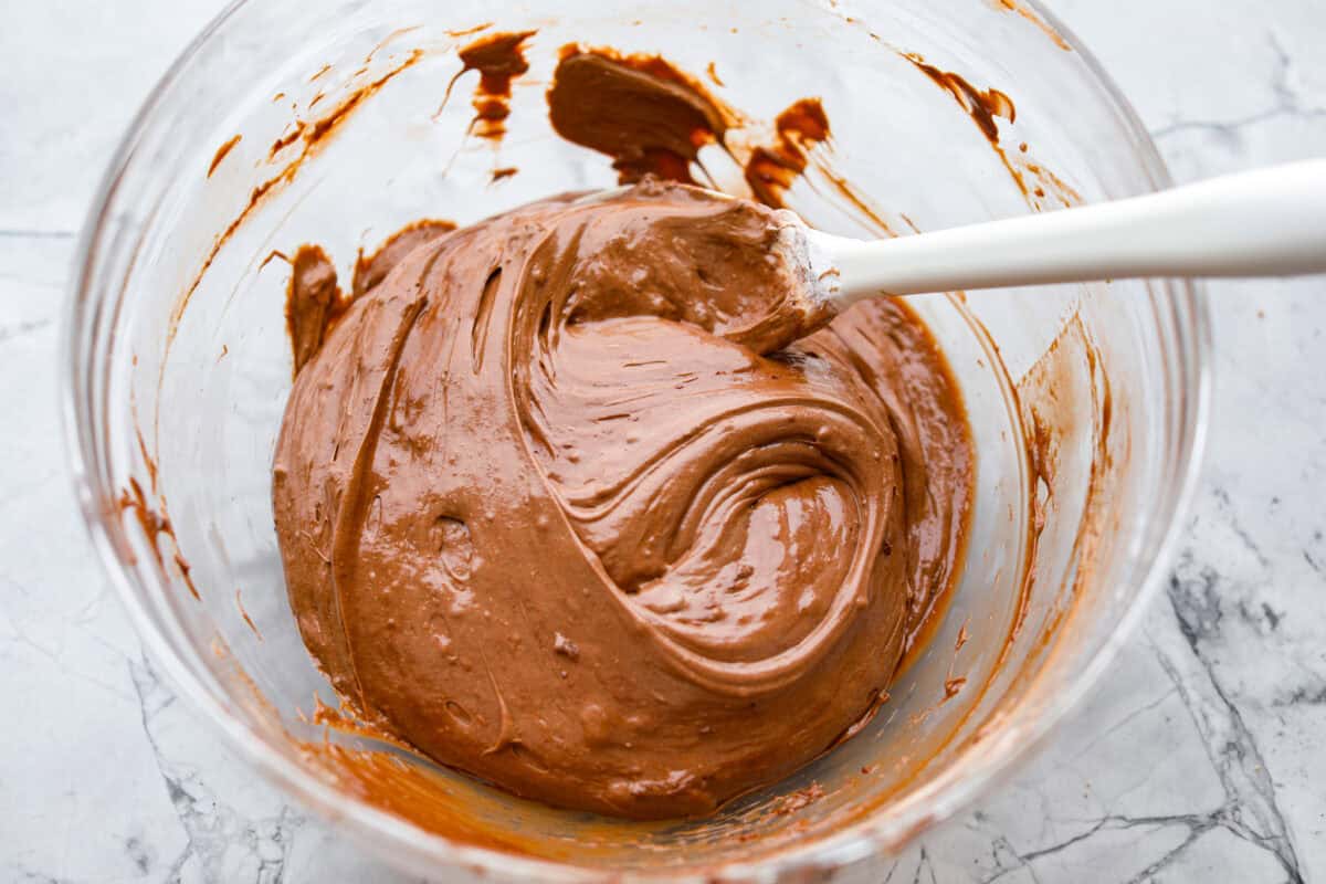 This 3 Ingredient Cool Whip Candy tastes just like a Three Musketeers! Fluffy on the inside, smooth chocolate on the outside, and so easy to make. It is the kind of treat you stash in the freezer and keep sneaking for yourself! Whipped topping added to the melted chocolate.