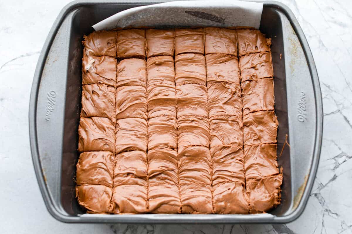 This 3 Ingredient Cool Whip Candy tastes just like a Three Musketeers! Fluffy on the inside, smooth chocolate on the outside, and so easy to make. It is the kind of treat you stash in the freezer and keep sneaking for yourself! Set up filling cut into 36 even pieces.