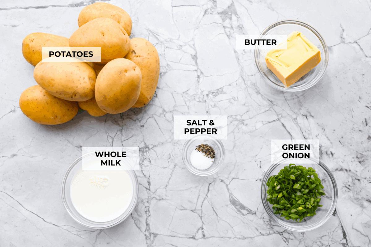 Overhead shot of labeled Irish champ potatoes ingredients. 