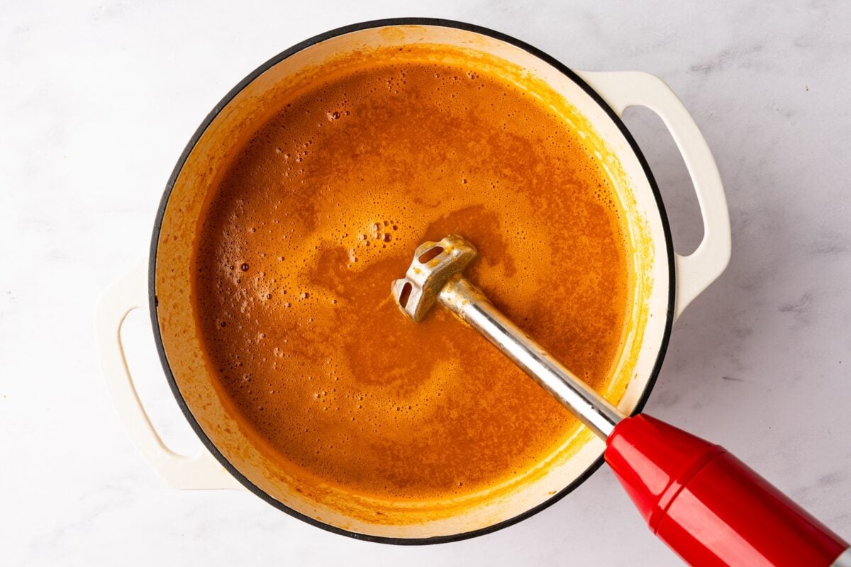 immersion blender blending albondigas soup broth