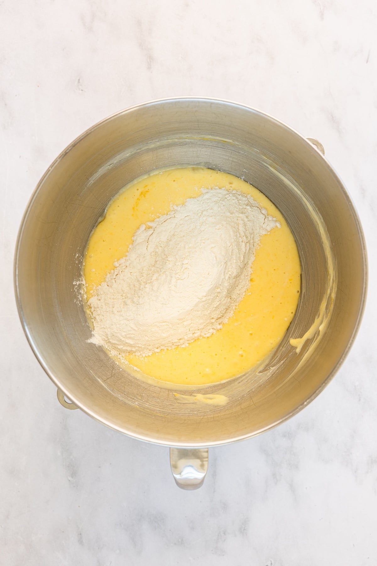 medium bowl with flour mixture added to wet mixture