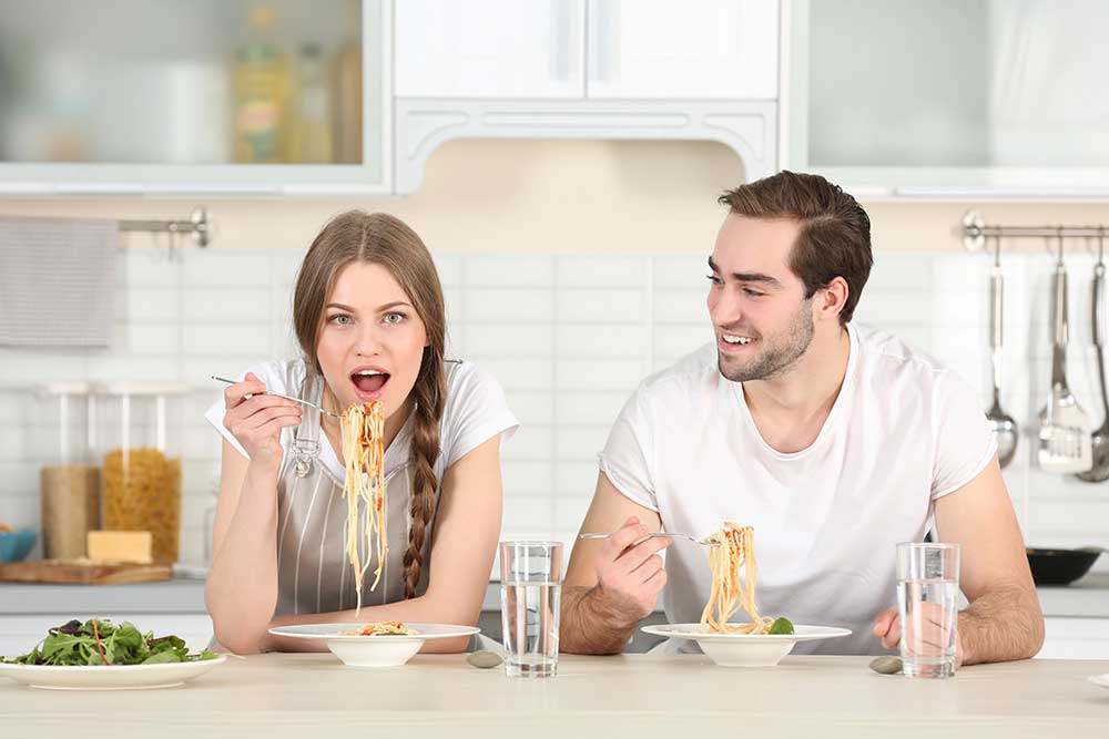 Authentic Italian marinara sauce served over pasta — romantic Italian dinner for two at home