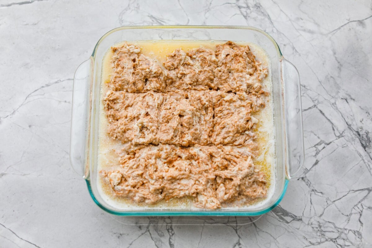 Biscuit mixture scored into 9 pieces. 