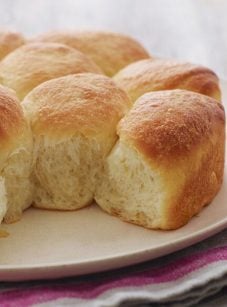 Plate of dinner rolls.
