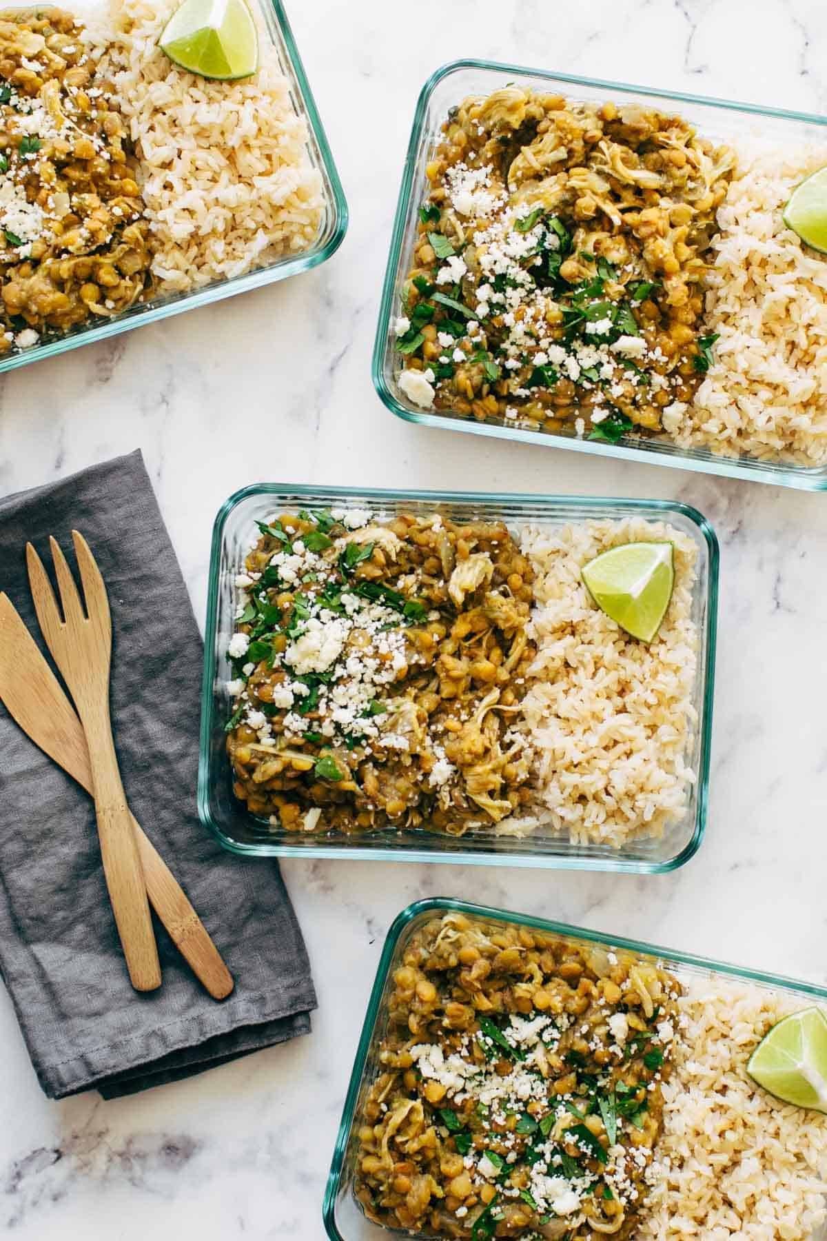 Cilantro lime chicken and lentils and rice in containers.