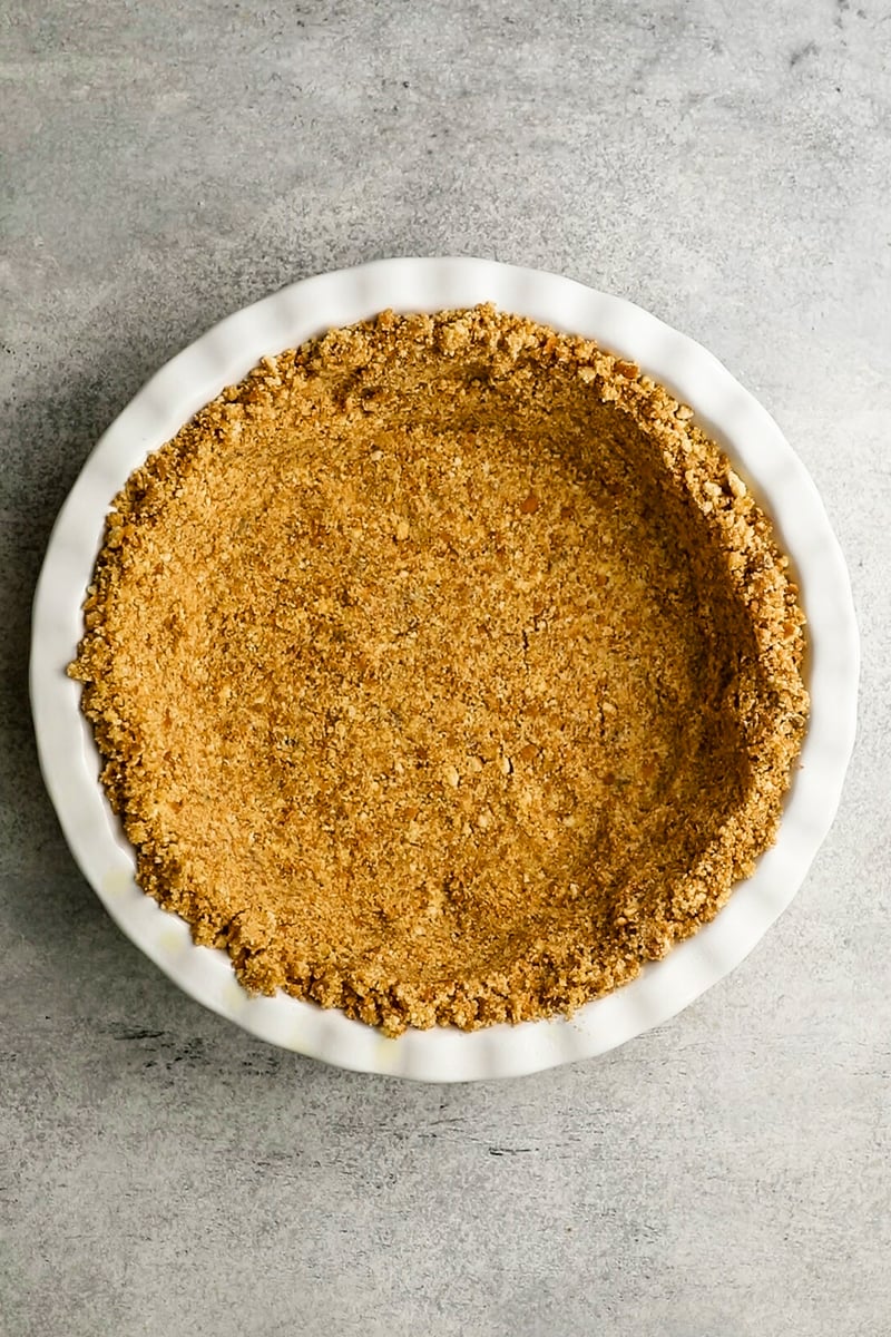 nilla wafer crust pressed into white deep dish pie plate