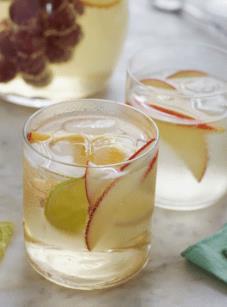 Two glasses of sparkling white sangria.