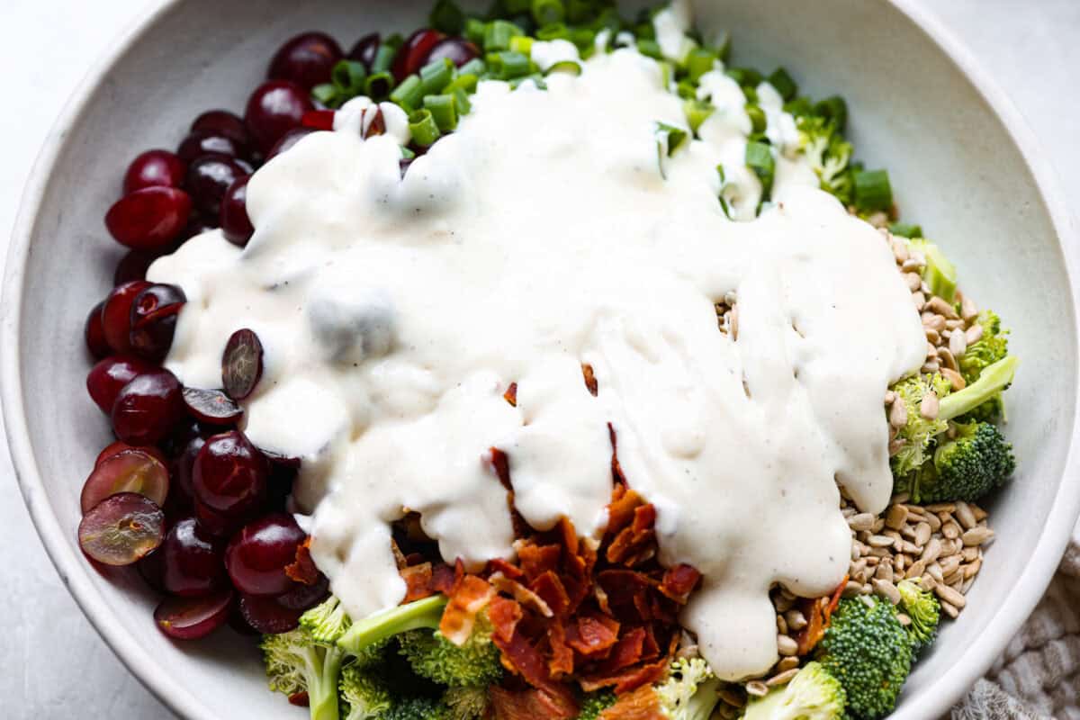 Dressing added to the top of the salad ingredients. 