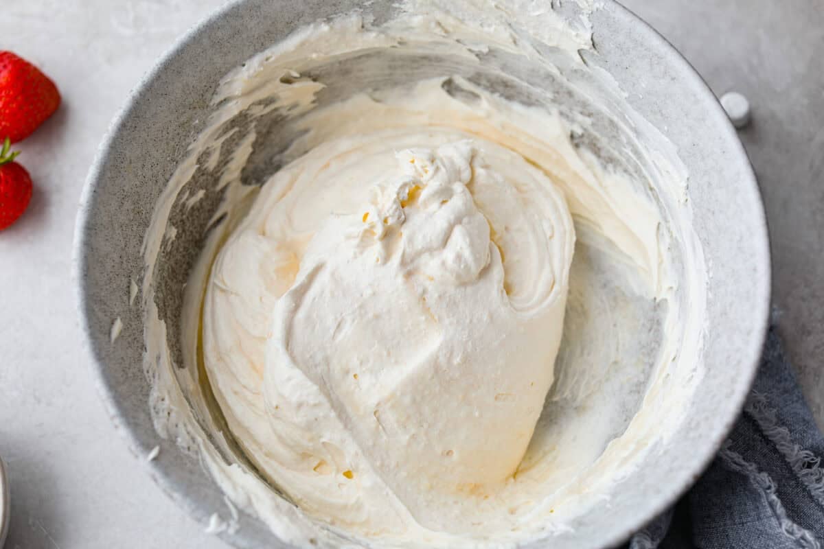 Whipped topping added to the pudding mix and vanilla yogurt. 