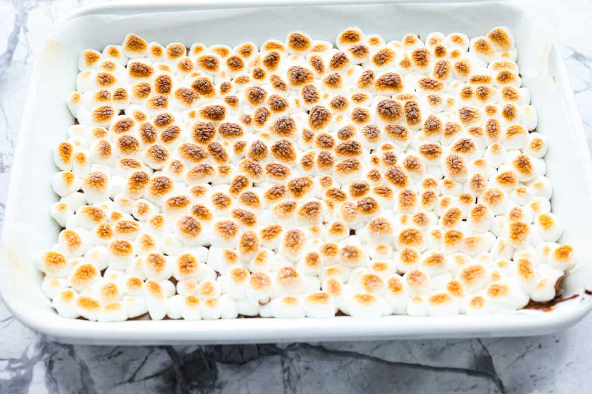 Mini marshmallows added to the top of the chocolate and toasted using the broiler in the oven.
