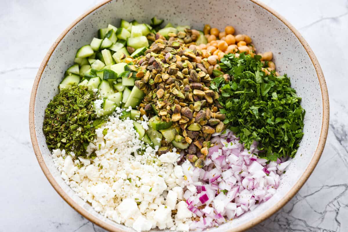 All of the ingredients added to a large bowl. 