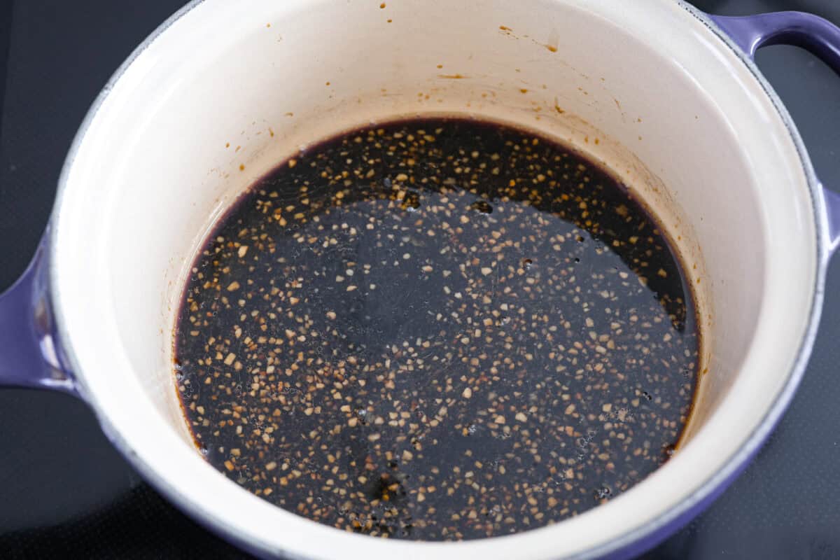 Sauce ingredients added to a saucepan. 