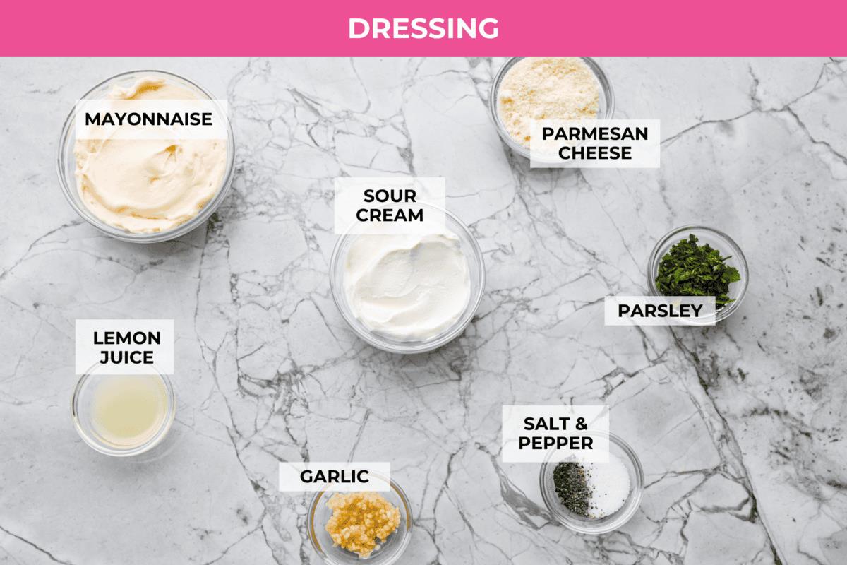 Overhead shot of labeled dressing ingredients. 