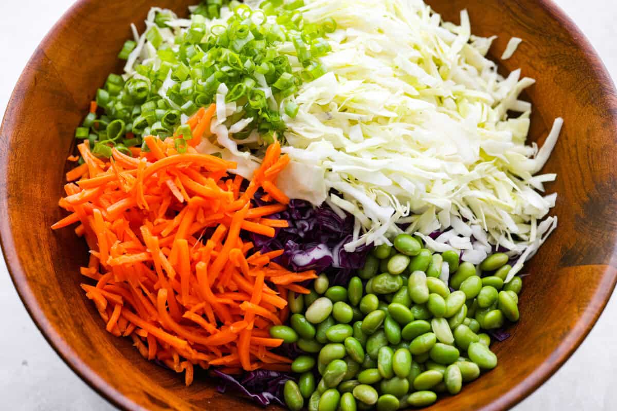 Sliced up veggies for the salad in a bowl.