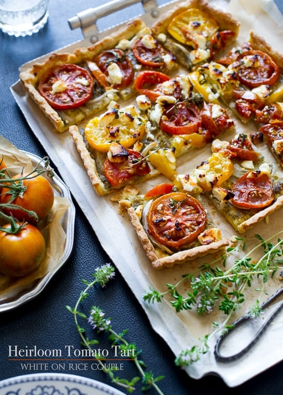 Heirloom Tomato Tart Recipe | WhiteOnRiceCouple.com Heirloom Tomato Tart on a baking sheet