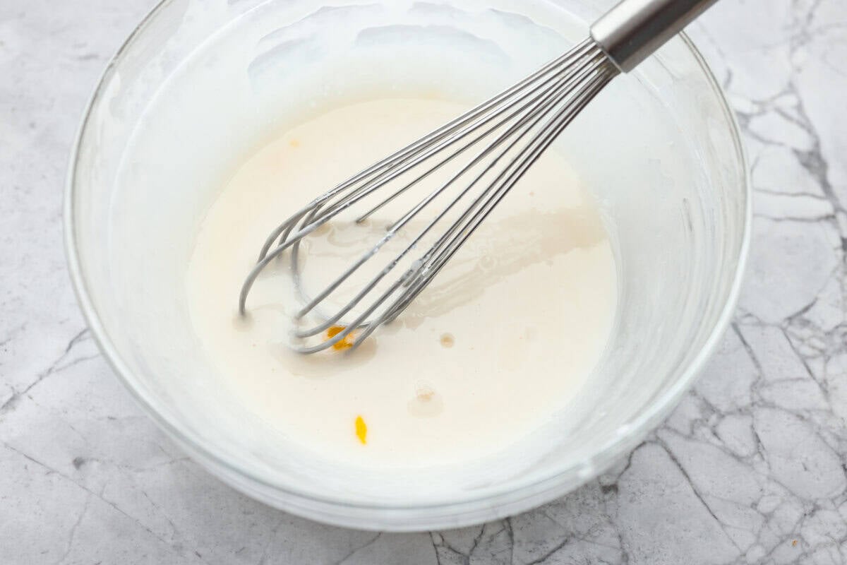 Glaze ingredients whisked together in a bowl. 