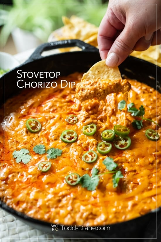 tortilla chip dipping into stovetop chorizo dip
