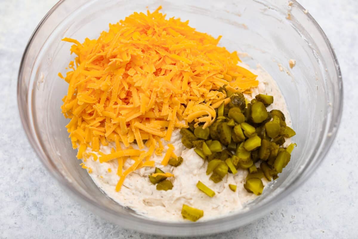 Cheese and pickles added to the dough. 