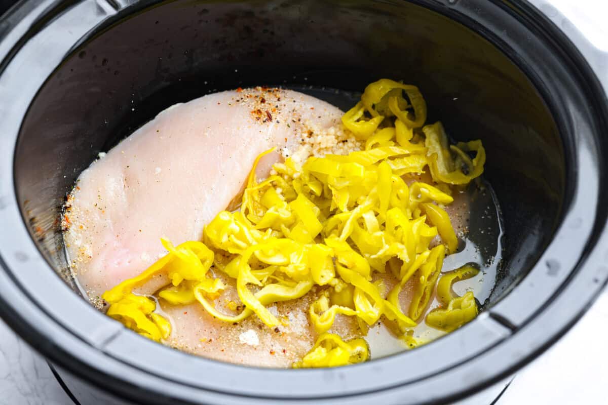 Slow cooker full of the ingredients. 