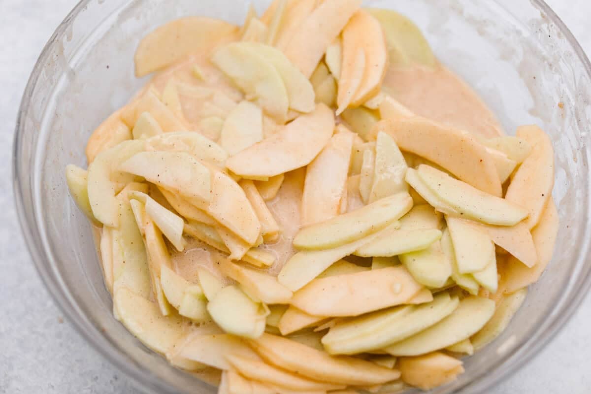 Thinly sliced apples coated in the batter. 
