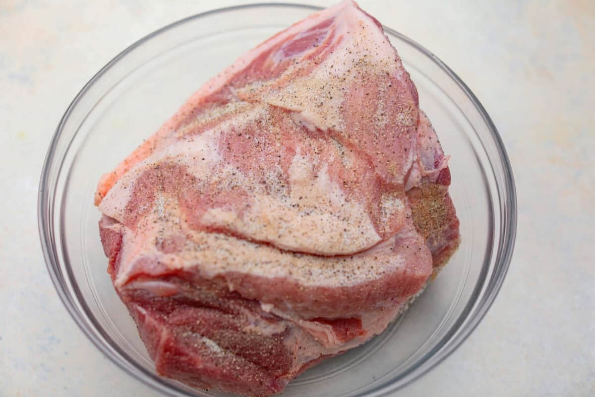 Pork roast seasoned with salt and pepper. 