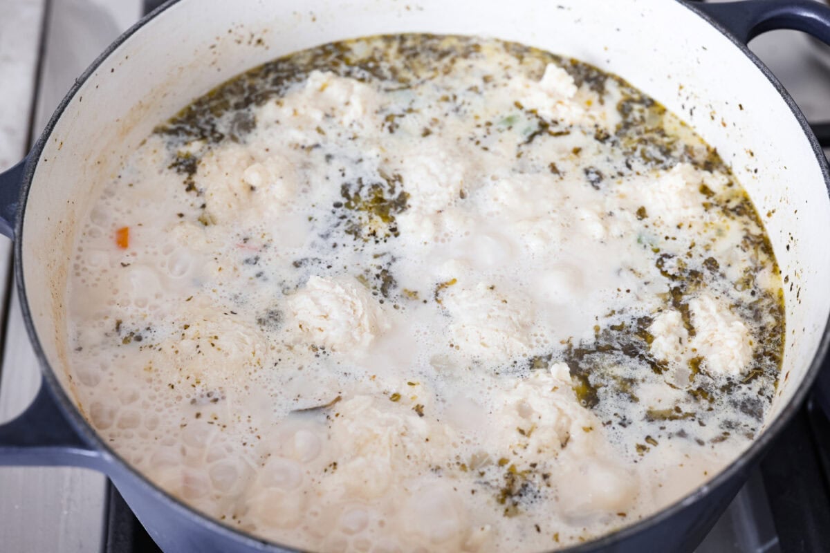 Chicken and dumpling batter added to the top of the soup. 