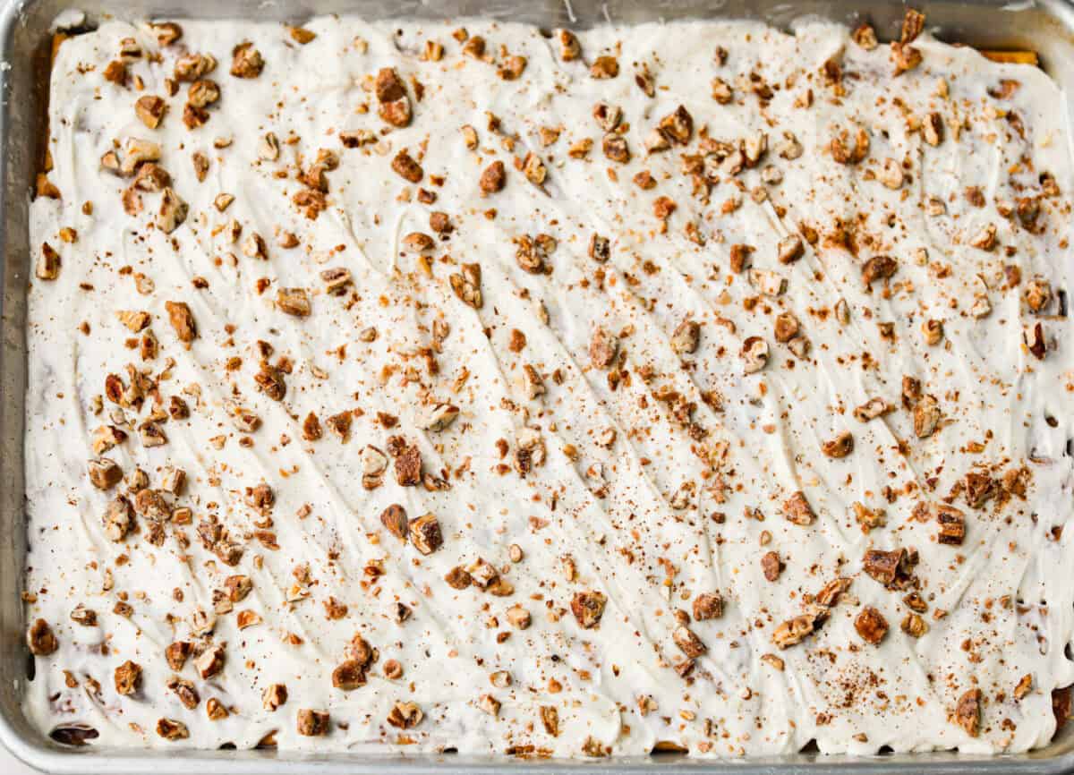 Pecans and pumpkin pie spice sprinkled over the top of the crack.